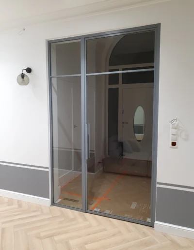 Słupsk zabudowa loftowa drzwi z doswietlem wiatrolap minimalistyczna stalowa